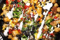 Loaded Tater Tot Nachos with Cheese, Jalapeno & Sour Cream