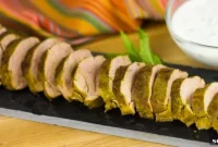 Curry-Rubbed Pork Tenderloin Recipe with Mint Yogurt Sauce