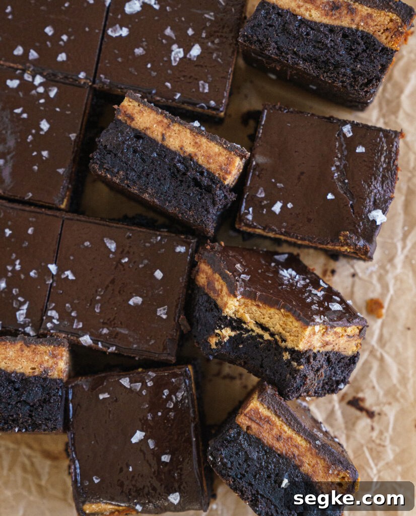 Sliced pumpkin cheesecake brownies