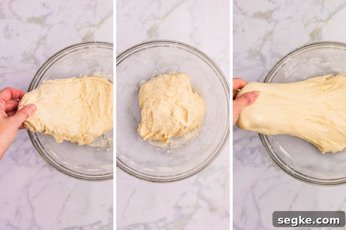 Homemade Strawberry Sourdough Bread Recipe 5 stretch and folds being performed.