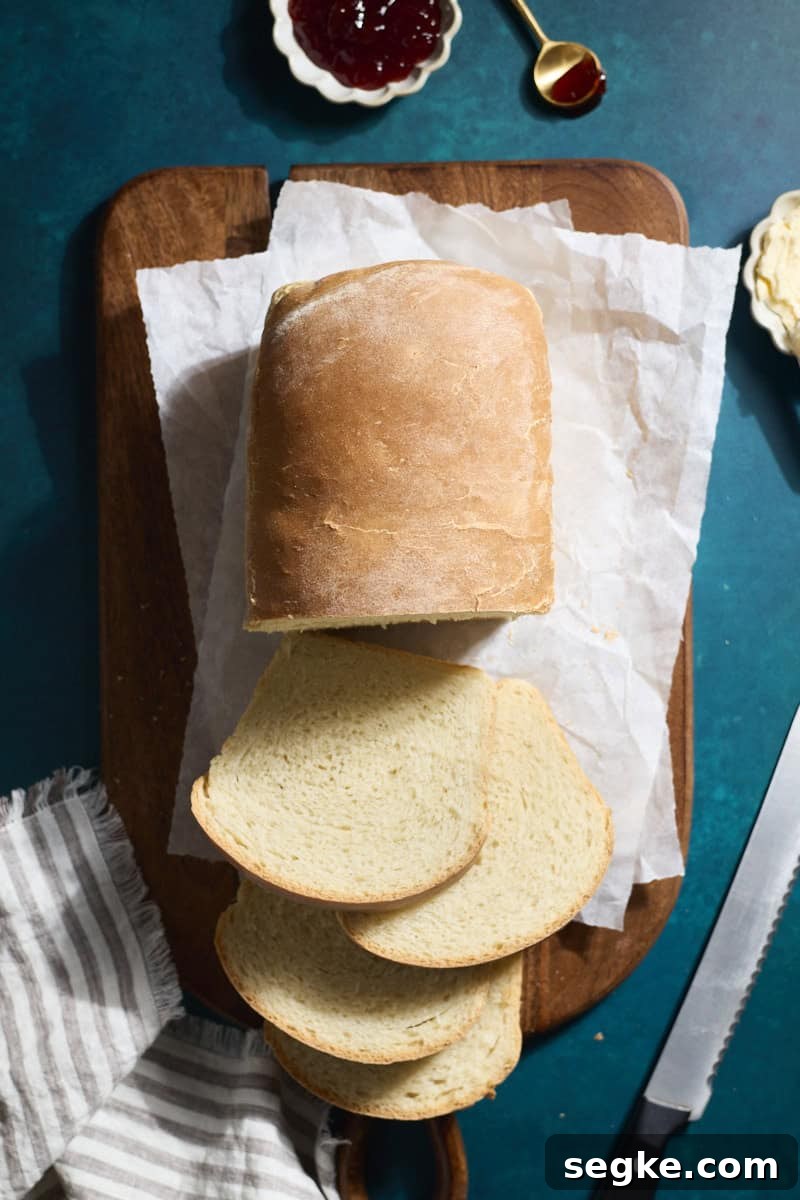 An overhead view of a sliced loaf of Sourdough Discard Sandwich Bread.
