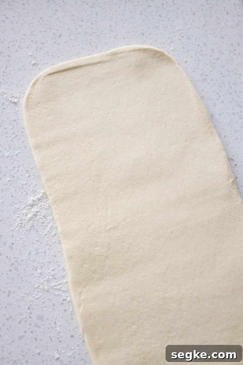 Dough rolled into a rectangle.