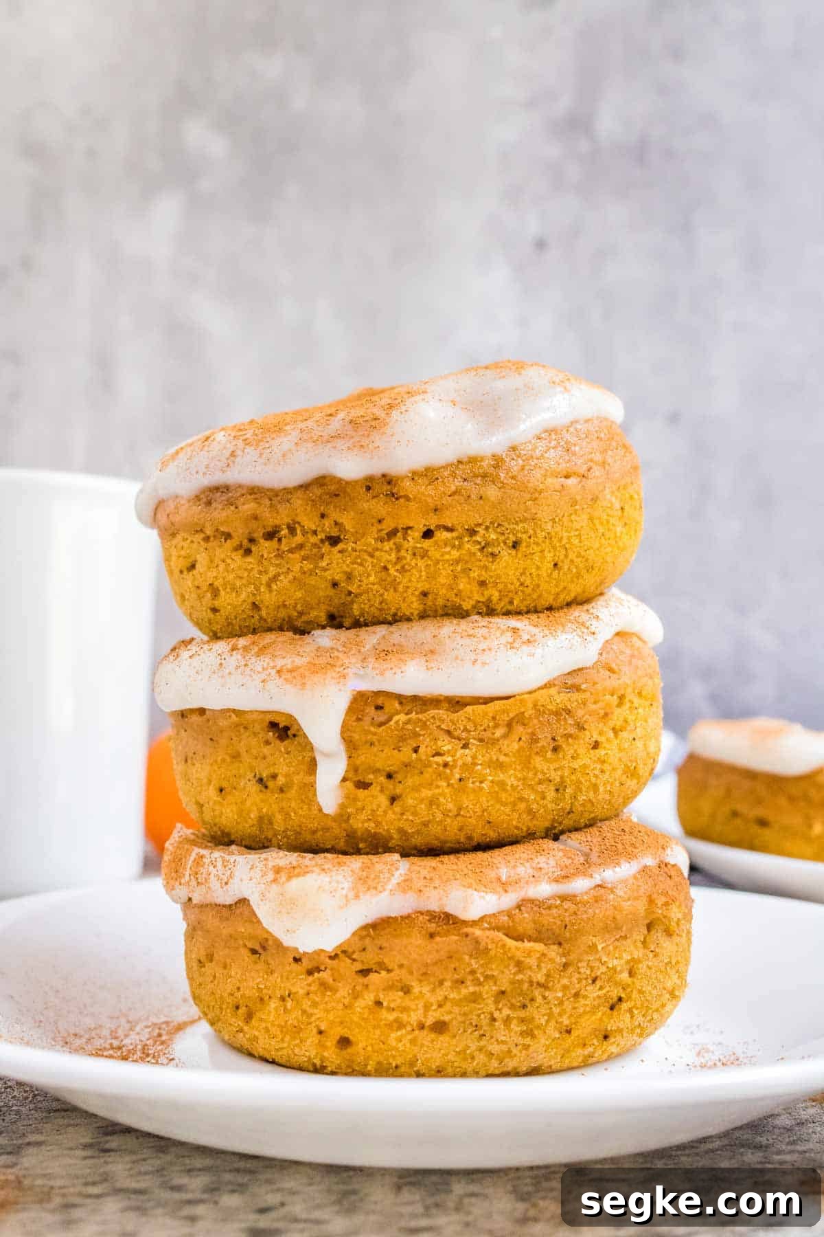 Pumpkin Spice Donuts with Cream Cheese Glaze.