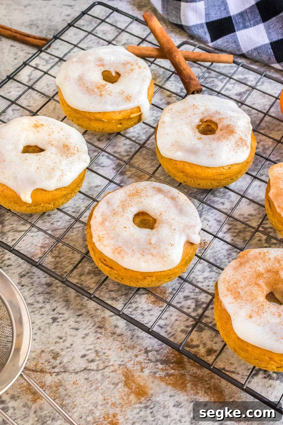 Pumpkin Spice Donuts with Cream Cheese Glaze.