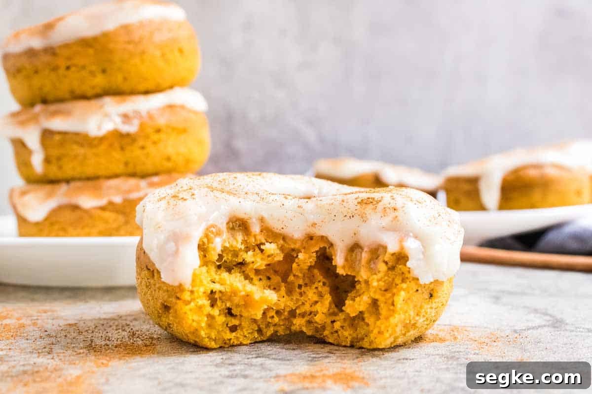 Pumpkin Spice Donuts with Cream Cheese Glaze.