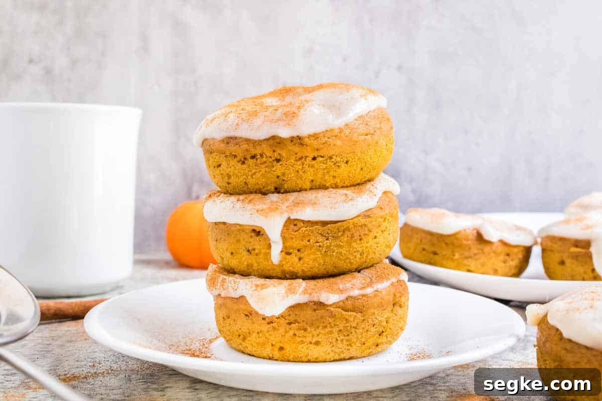 Pumpkin Spice Donuts with Cream Cheese Glaze.