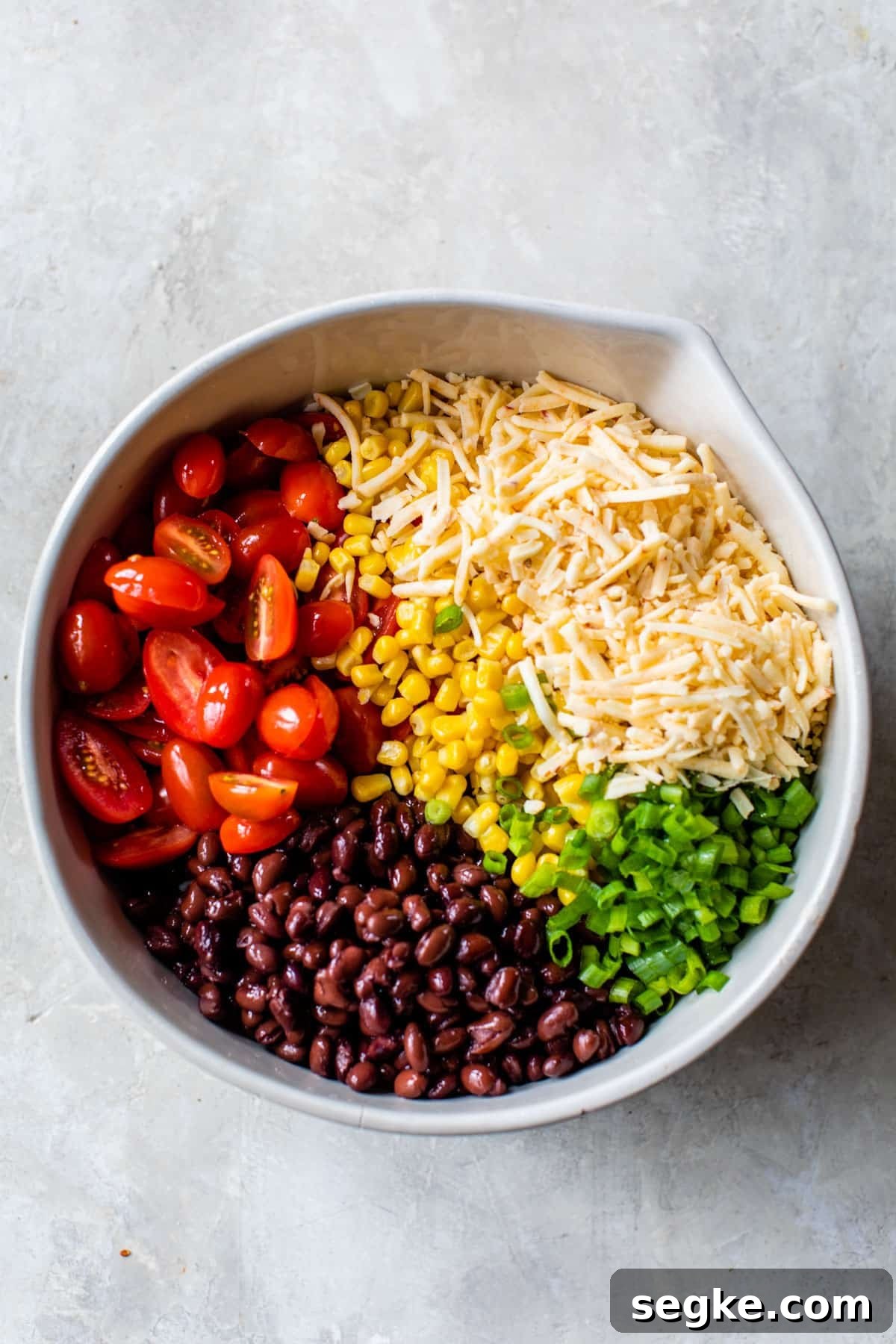 Southwest Taco Pasta Salad Recipe 3 all of the ingredients in the taco pasta salad separated in a large bowl
