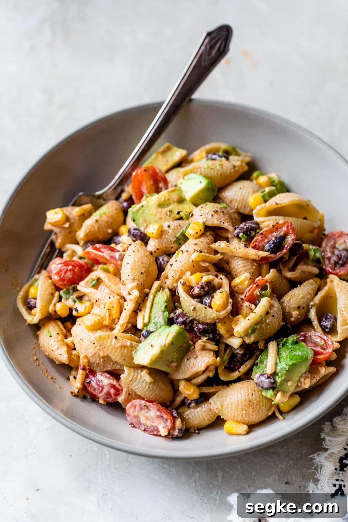 Southwest Taco Pasta Salad Recipe 5 an overview of taco pasta salad in a bowl with a fork