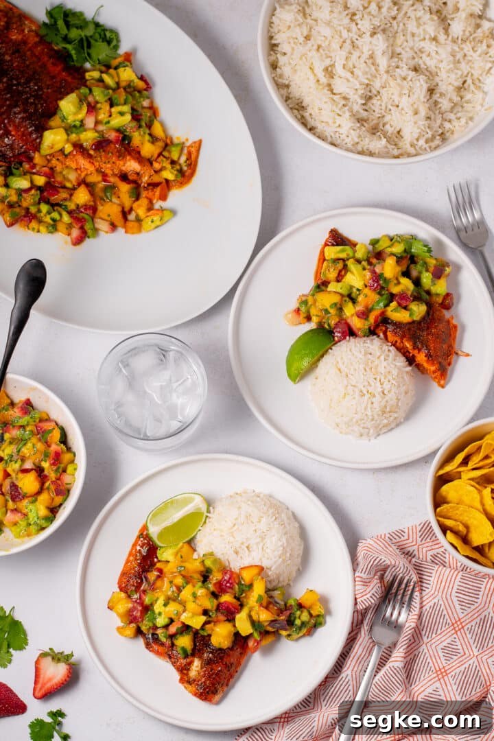 How to Make Fluffy Coconut Basmati Rice 6 two plates with coconut rice, paprika salmon and nectarine salsa