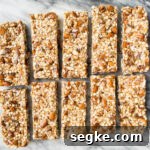 No bake granola bars on a marble surface.