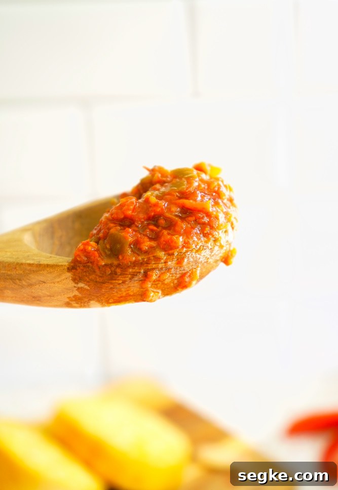 Scratch made tomato sauce on spoon