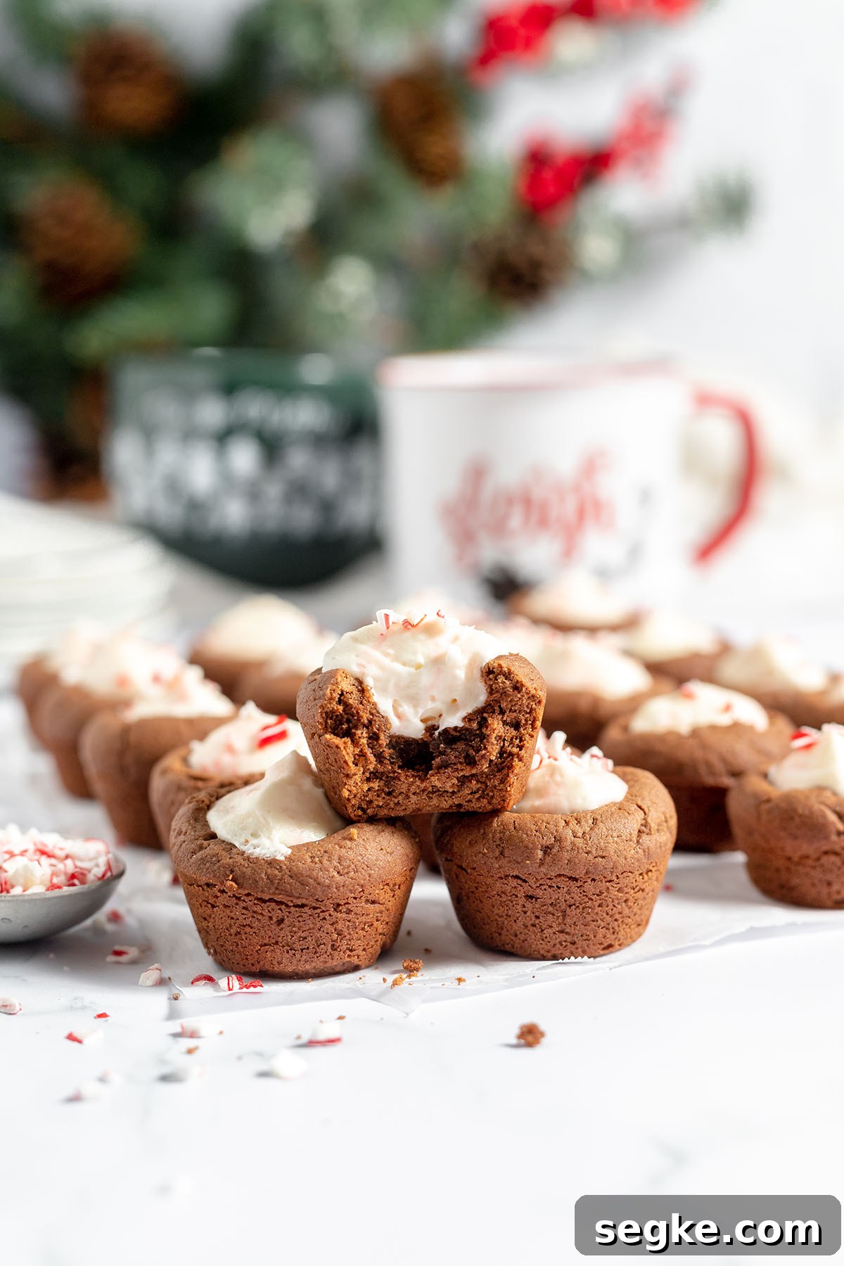 Mini Peppermint Cheesecake Cookie Cups Recipe 6 Peppermint Cheesecake cups set out on counter.