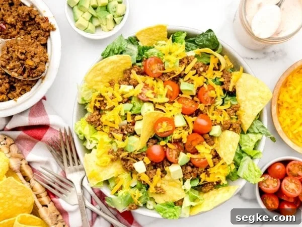 Walking Tacos: Portable Taco Cups for Parties and Tailgates 9 A bowl of taco salad recipe with a homemade dressing.