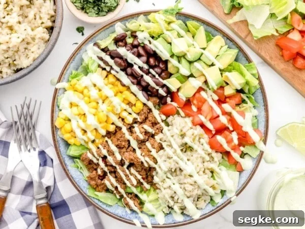 Walking Tacos: Portable Taco Cups for Parties and Tailgates 6 Taco bowl with dressing drizzled on top.