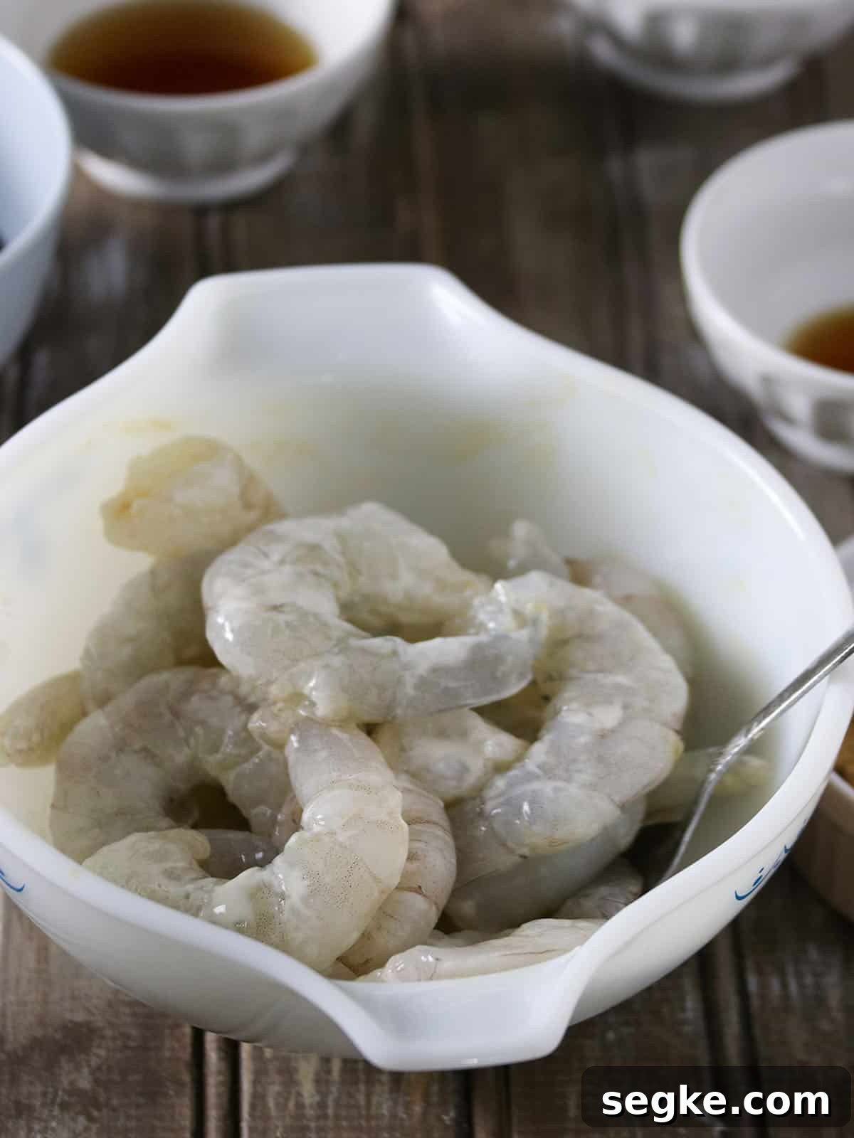 velveting shrimp in a bowl