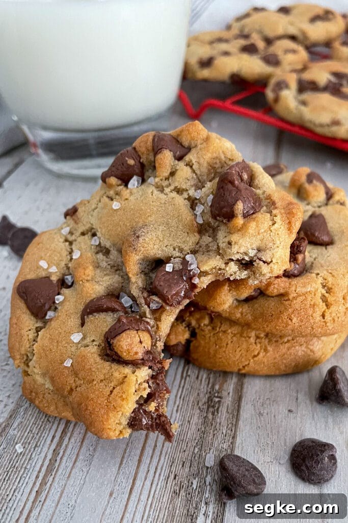 Air fryer chocolate chip cookies with a glass of milk for serving