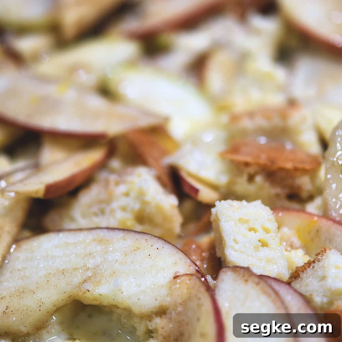 closeup of apples and bread cubes before baking