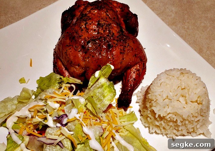 Smoked Mediterranean Cornish Game Hens Recipe 5 Mediterranean Smoked Cornish Game Hen served with white rice and a green salad