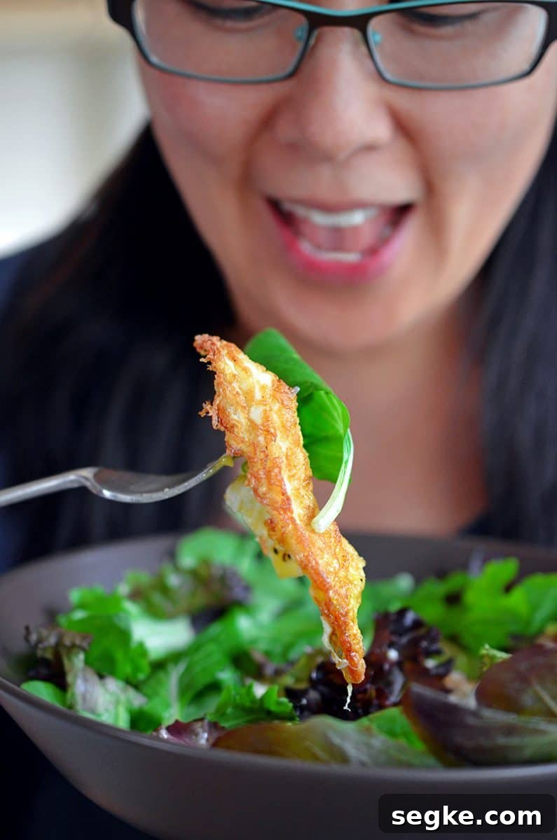 Michelle Tam is happily eating a Sunnyside Salad