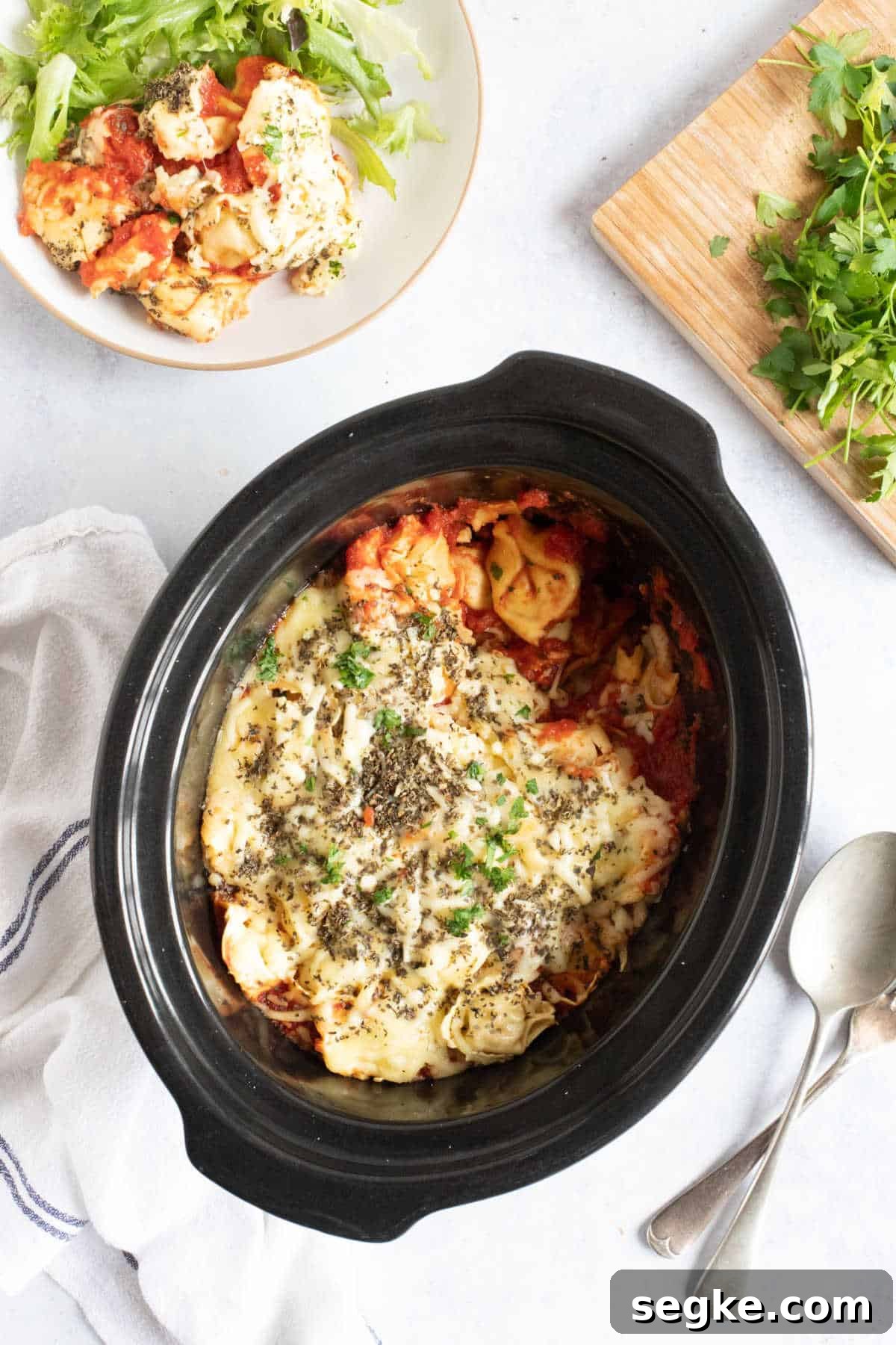 Cheesy tortellini in slow cooker.