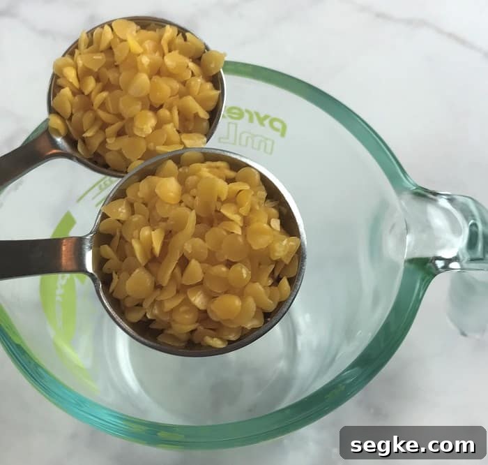 Melting beeswax in a double boiler.