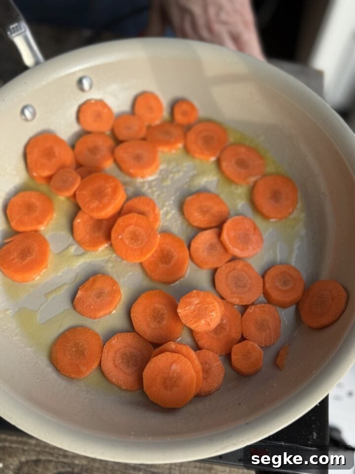 Sauteed carrots in a skillet