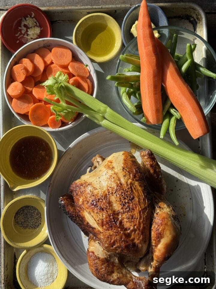 a photo of the ingredients for rotisserie chicken soup on a sheet tray