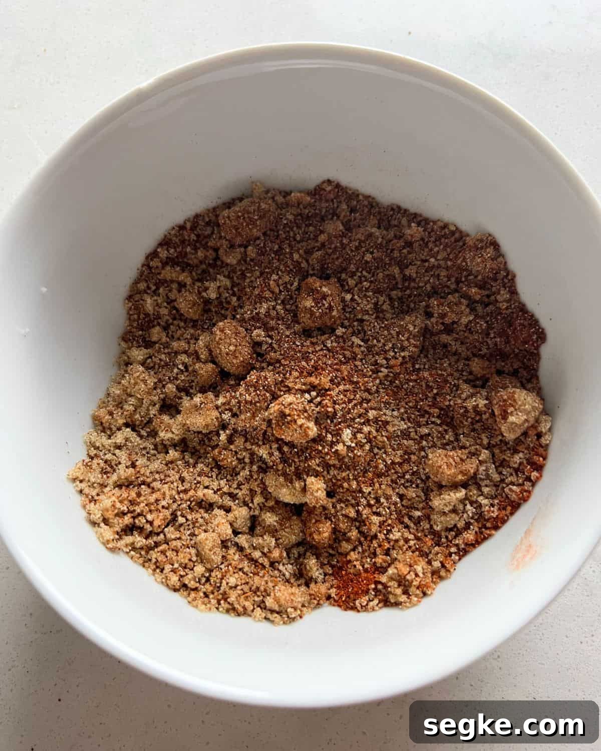 Combined seasonings for pulled pork in a bowl.