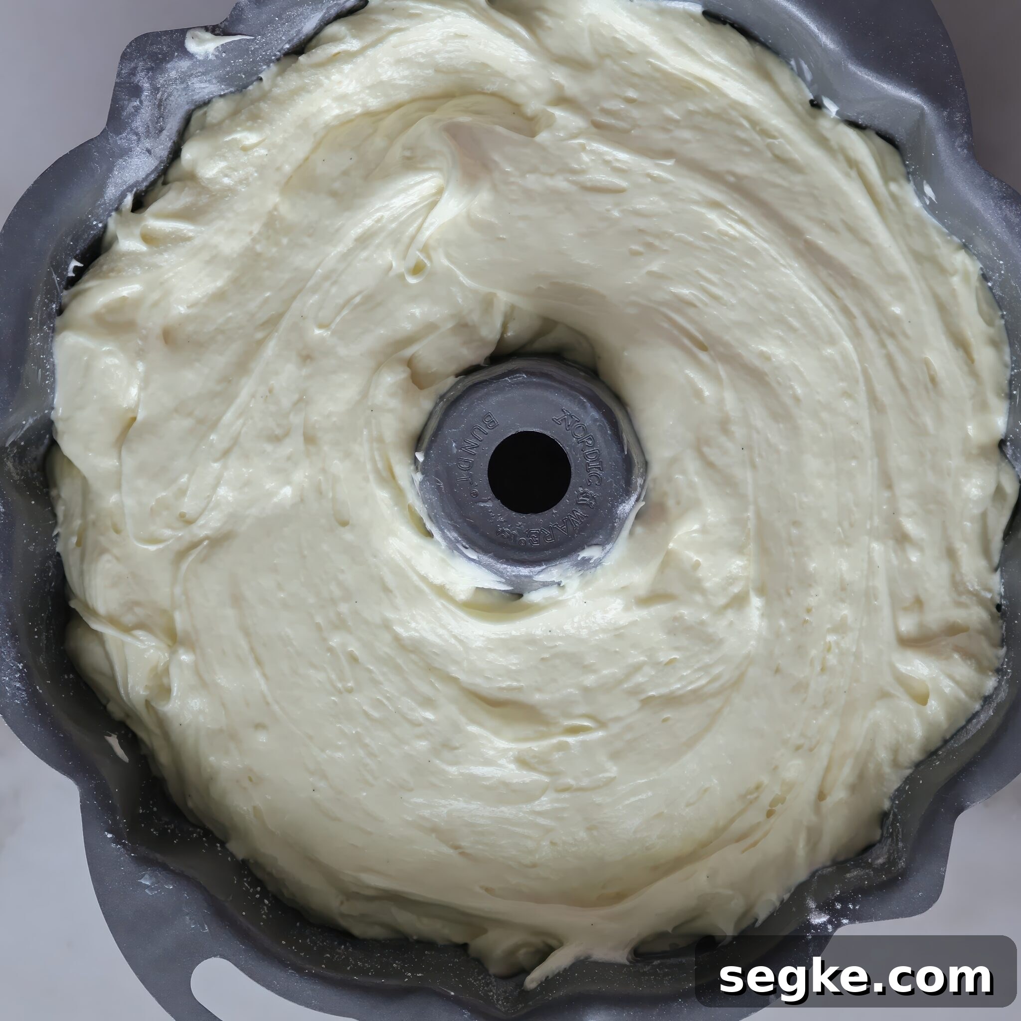 Moist Gluten-Free Pound Cake Recipe 6 cake batter spread into bundt pan.