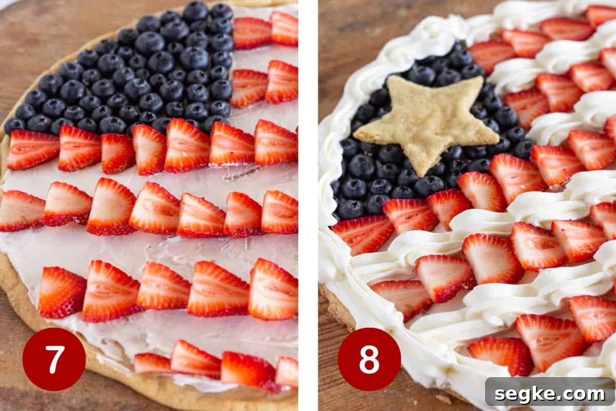 Finished flag fruit pizza decorated with strawberries, blueberries and a star cookie.