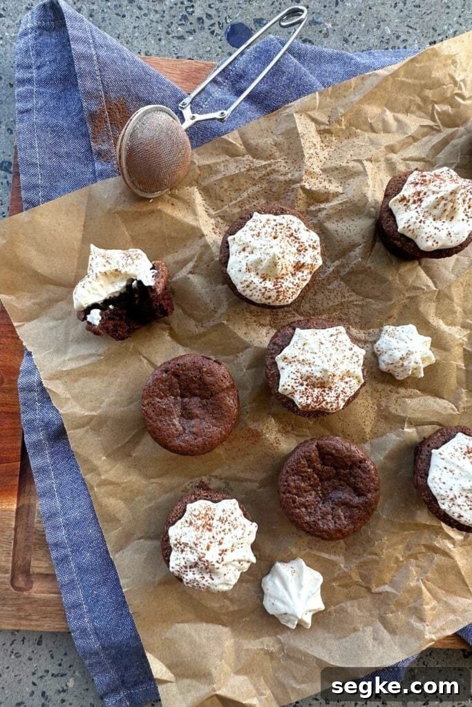 Sourdough chocolate brownie bites cooling on a wire rack.