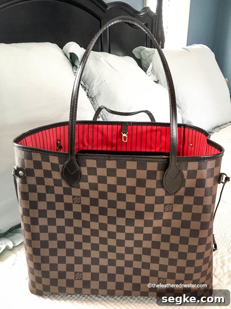 Neverfull tote with cerise lining