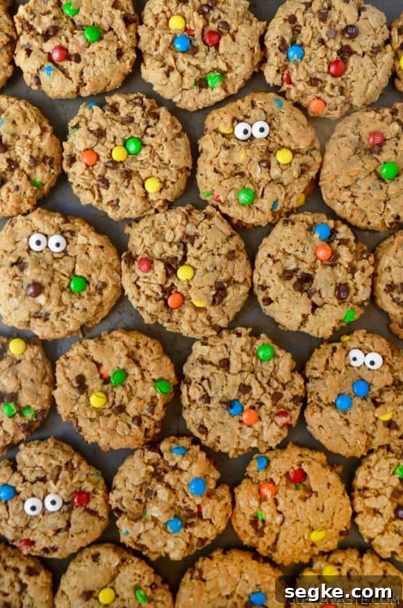 Spooky Halloween Dessert Recipes to Impress Guests 12 Monster Cookies studded with mini chocolate chips and M&Ms