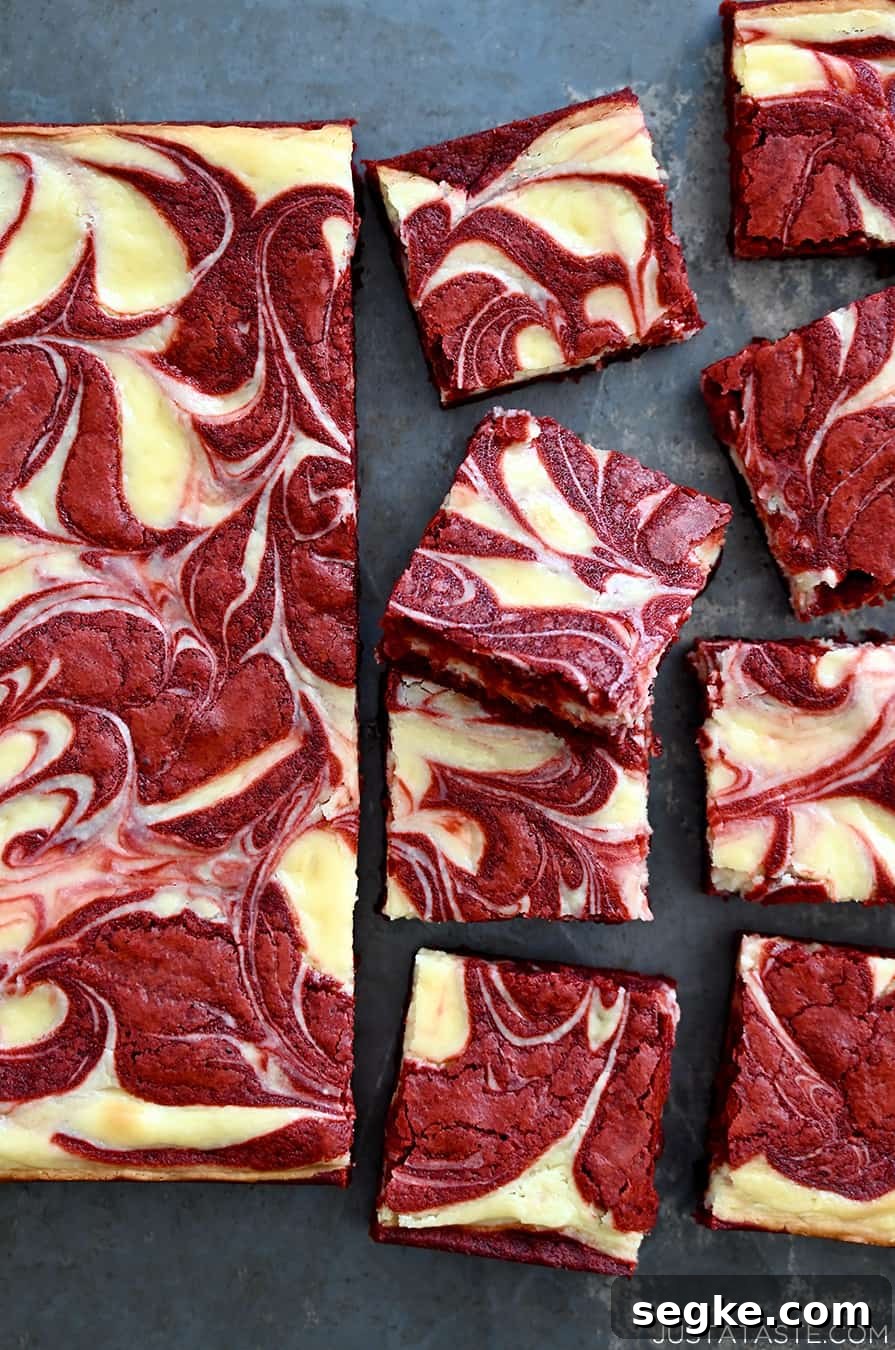 Spooky Halloween Dessert Recipes to Impress Guests 16 The best Red Velvet Cheesecake Brownies sliced into perfect squares