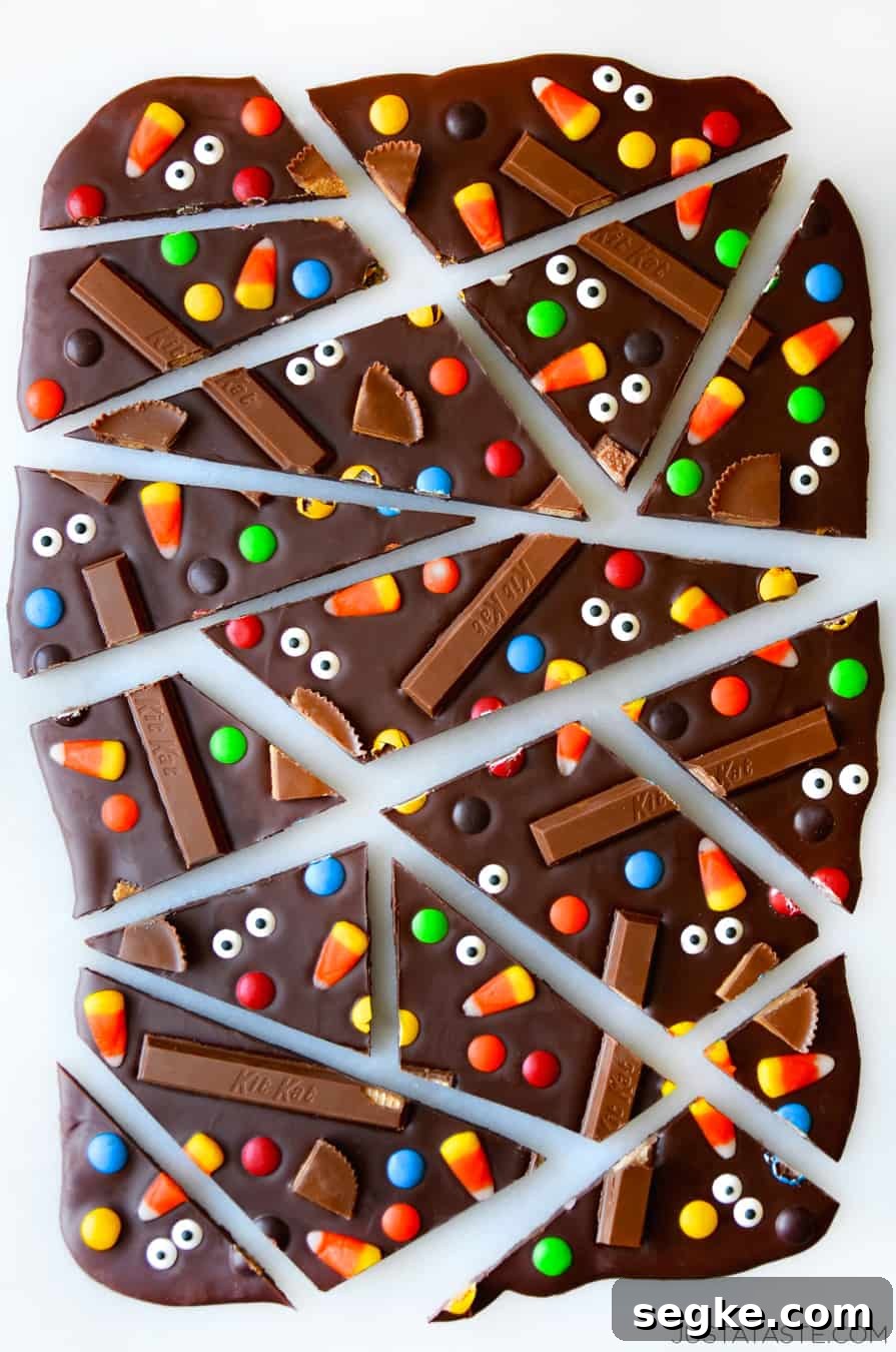 Spooky Halloween Dessert Recipes to Impress Guests 3 Halloween candy bark on a platter