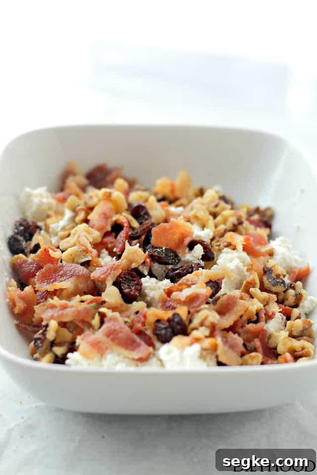 Goat Cheese, Bacon and Raisins Stuffed Chicken Breasts | www.diethood.com | Elegant, yet super easy recipe for chicken breasts stuffed with a delicious mixture of goat cheese, bacon, raisins and nuts. Goat Cheese, Bacon and Raisins Stuffed Chicken Breasts | www.diethood.com | Elegant, yet super easy recipe for chicken breasts stuffed with a delicious mixture of goat cheese, bacon, raisins and nuts.