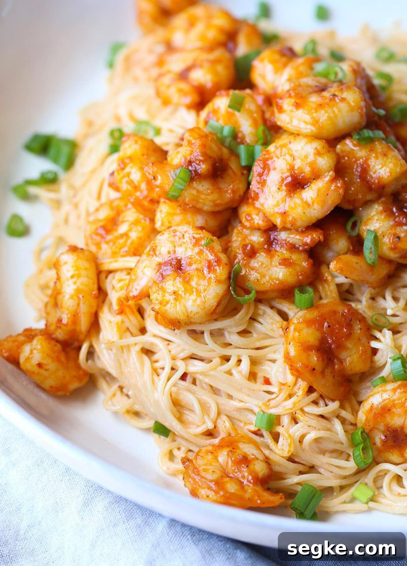 Spicy Chicken and Shrimp served on noodles