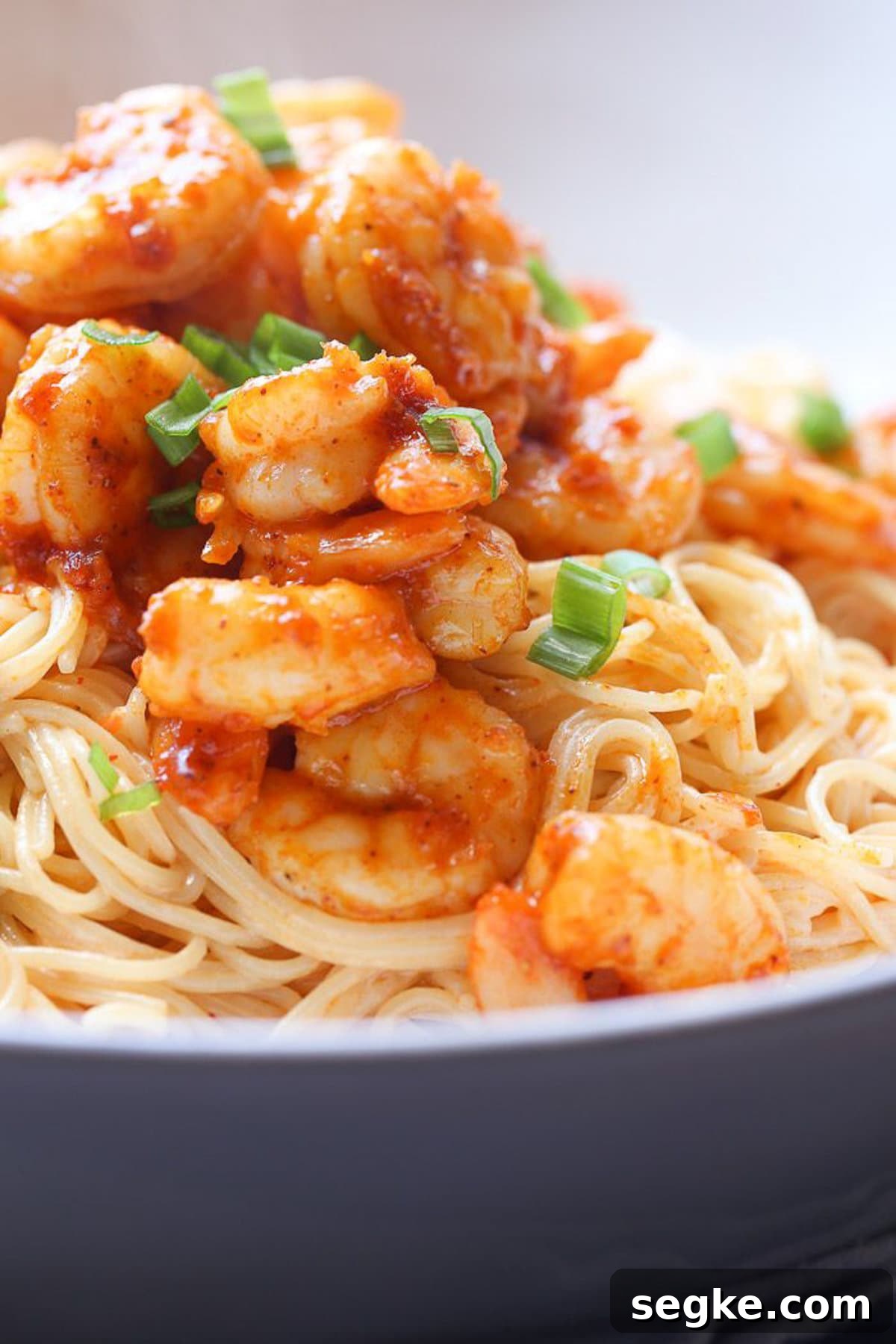 Closeup of bang bang shrimp pasta in a bowl.