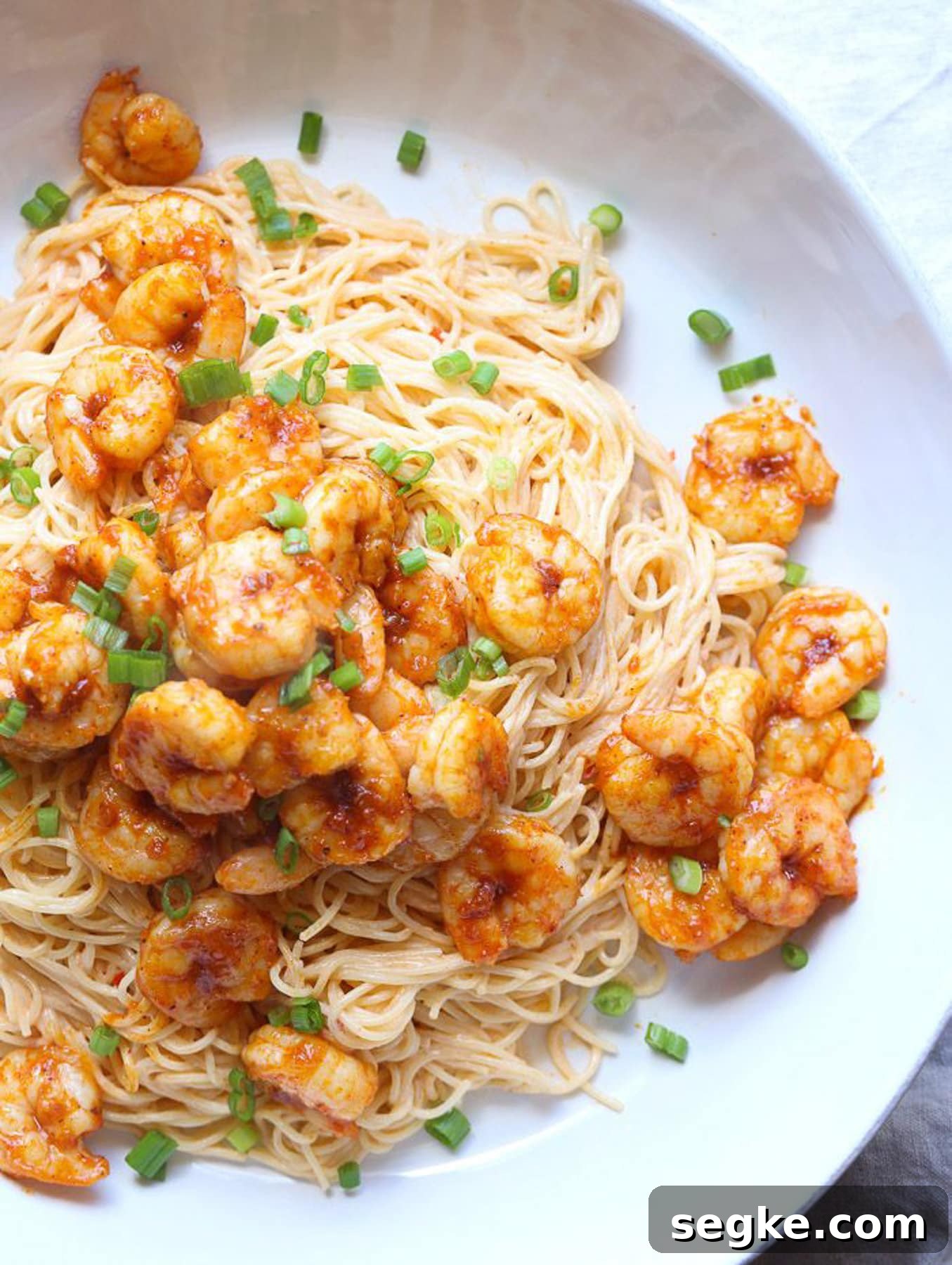 Overhead image of bang bang shrimp pasta in a bowl.