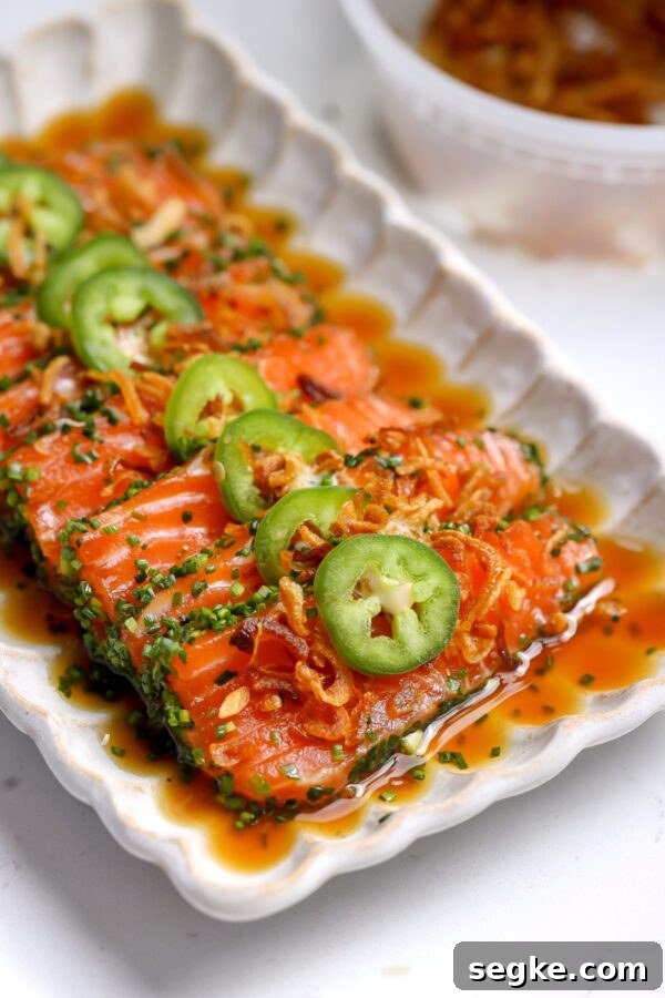 Chive-crusted salmon crudo with yuzu soy and spicy mayo — a fresh, elegant crudo appetizer recipe with crisp chives, jalapeño, and fried shallots.