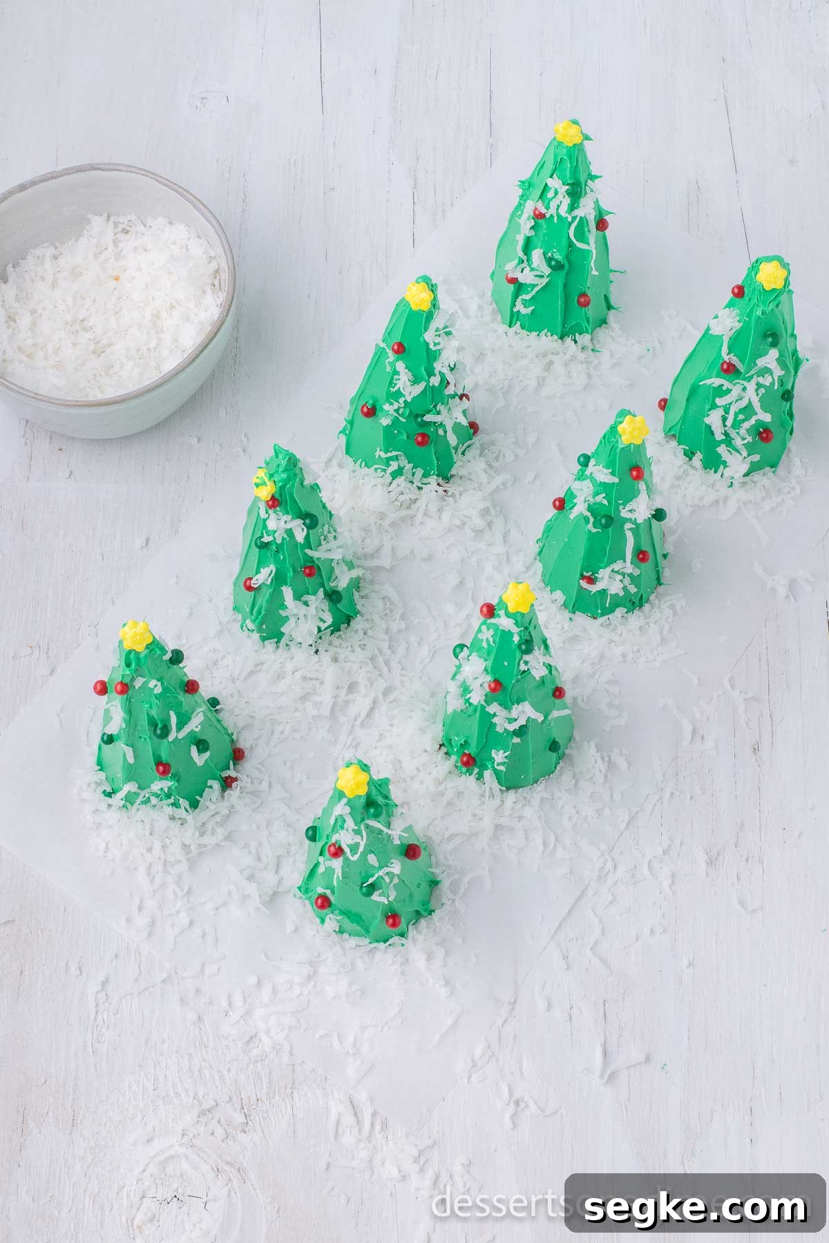 DIY Ice Cream Cone Christmas Tree Ornaments 9 Shredded coconut on top of the trees to look like snow.