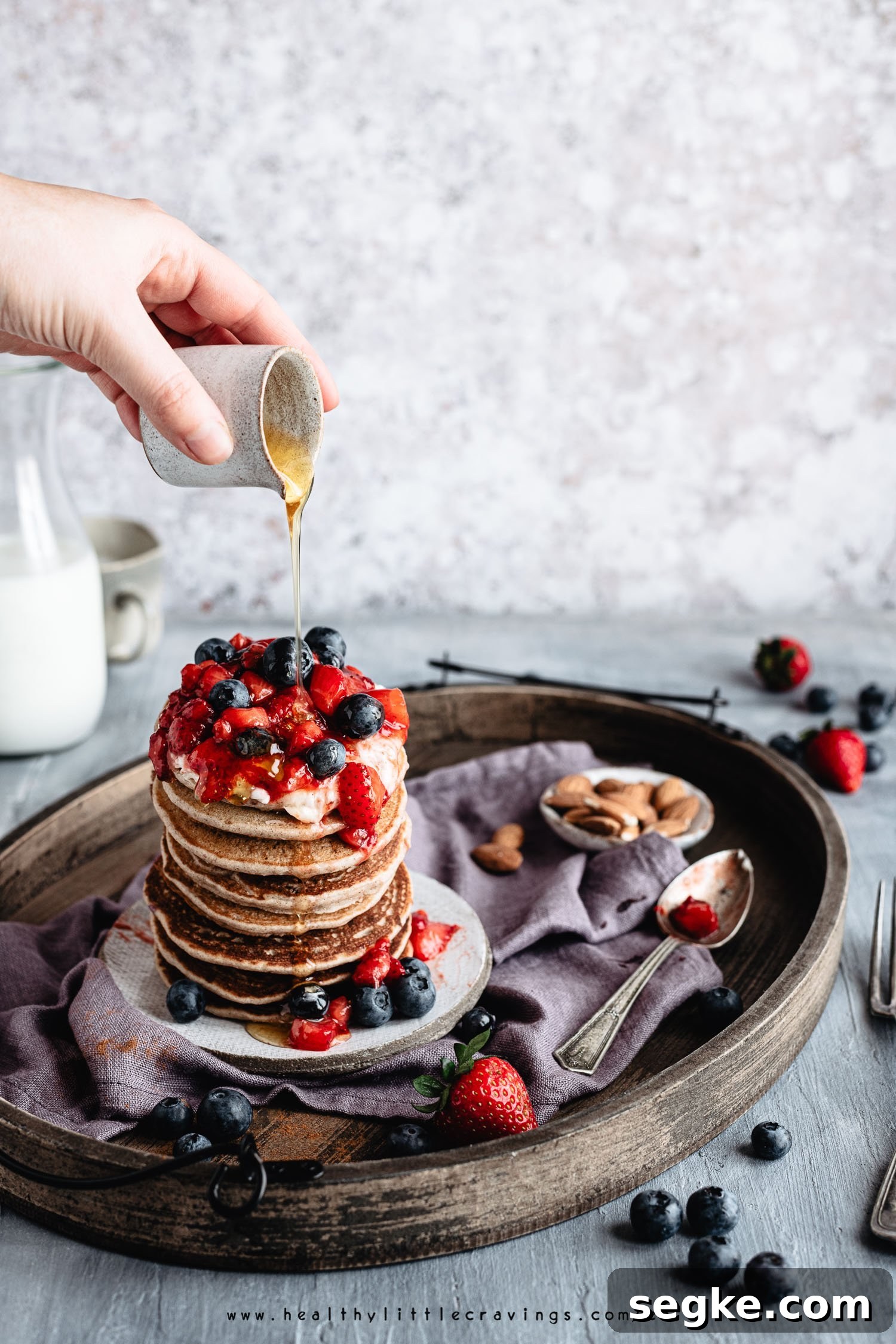 Stack of buckwheat pancakes with berries