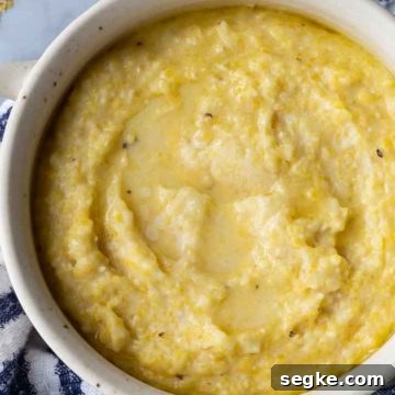 grits in a bowl with a blue and white kitchen towel underneath