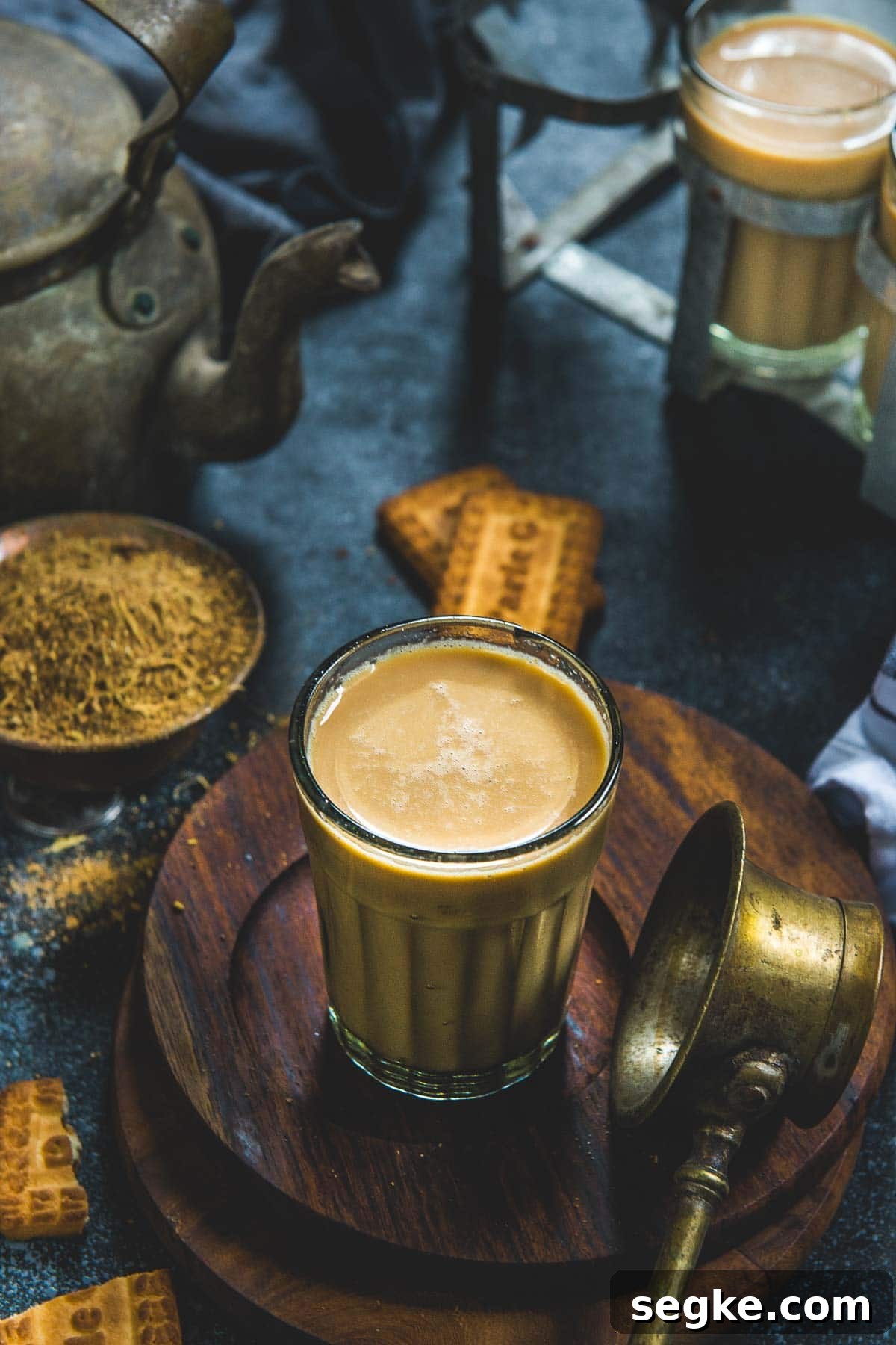 Masala chai served in a glass.