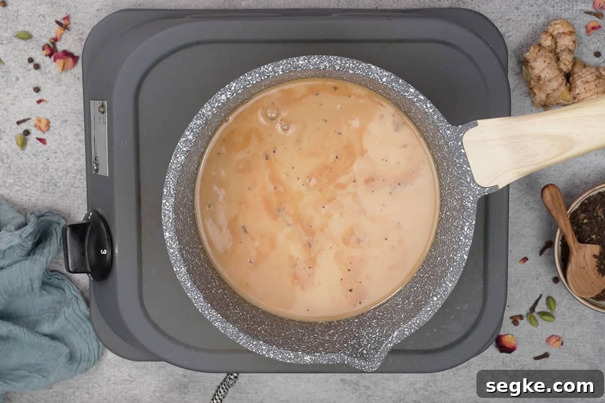 Milk added to the pan.