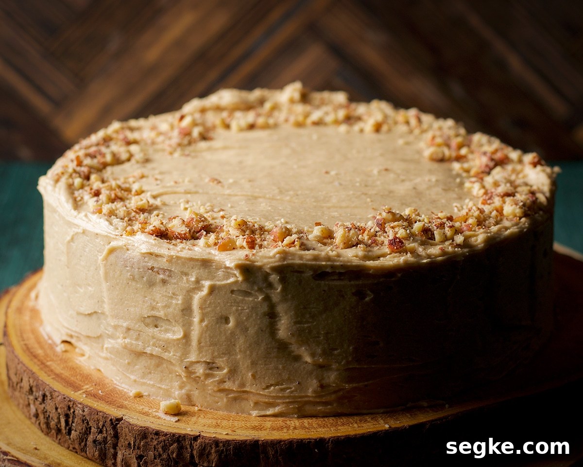 A single layer round cake frosted with maple miso brown butter frosting.