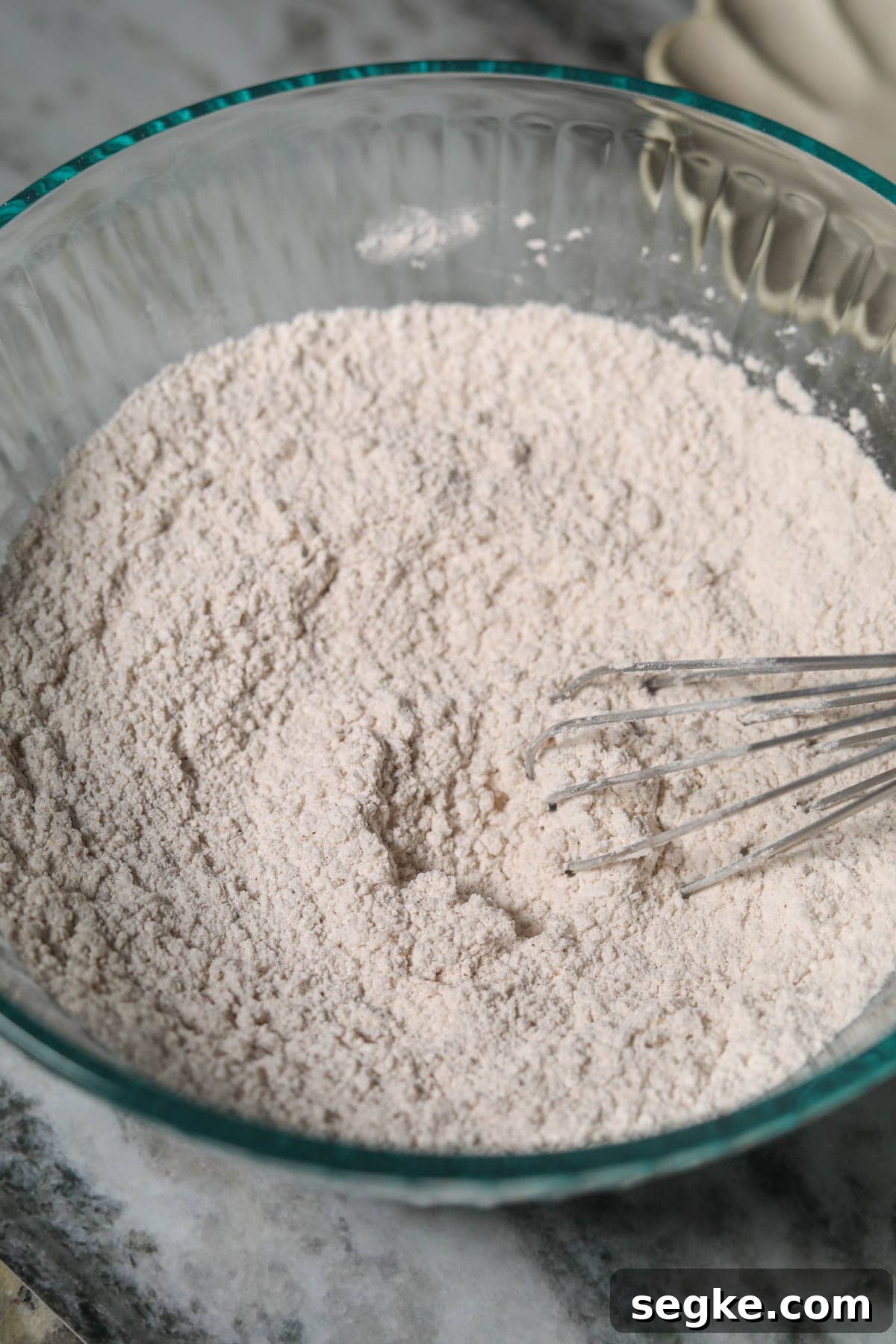 dry ingredients for pecan bundt cake in a bowl.