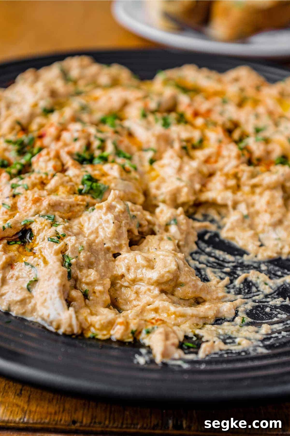 Circassian Chicken | cookeatworld.com A plate of Turkish Circassian Chicken with a fork