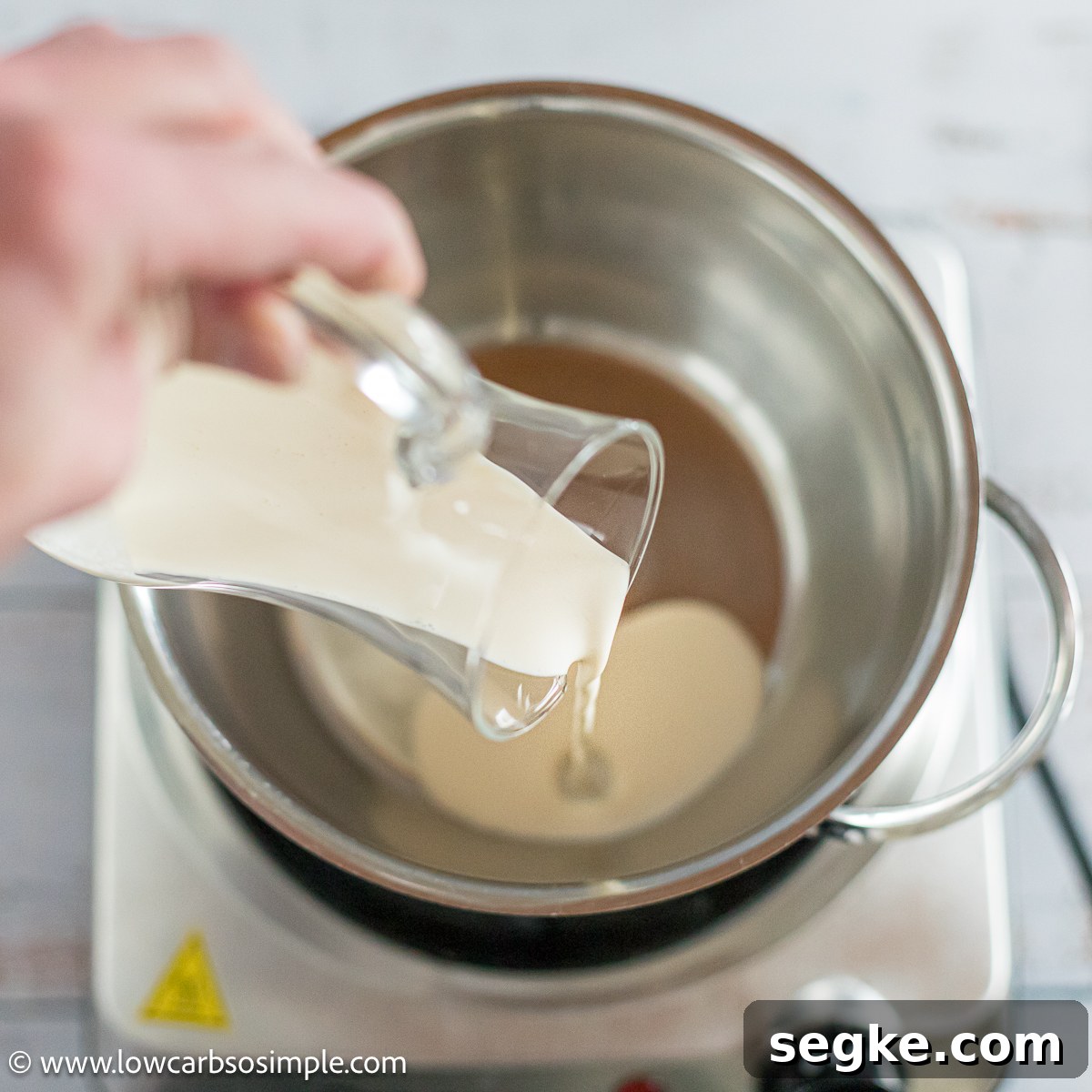 Keto Eggnog Gummies for Low-Carb Holiday Treats 2 Pouring Heavy Cream into Saucepan | Low-Carb, So Simple