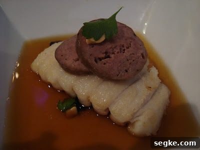Skate with duck sausage